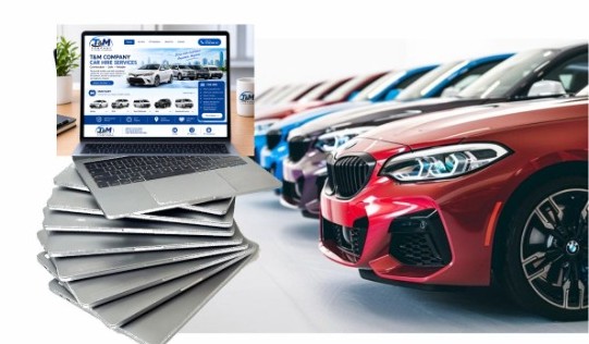A stack of laptops beside a row of hire cars, with the T&M car hire website open on a laptop