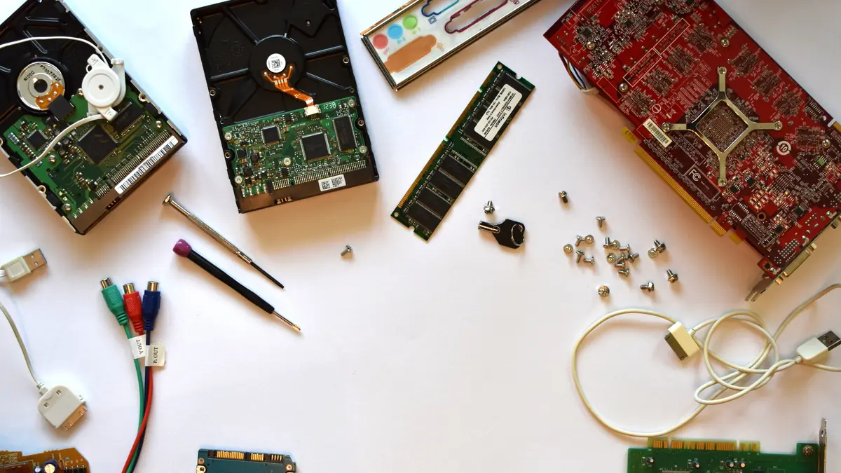 Computer parts and tools laid out for repair